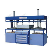 Semi automatic double head vacuum forming machine